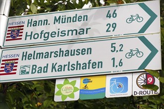 Direction signs to Hannoversch Münden, Hofgeismar, Bad Karlshafen, distance, symbol, various