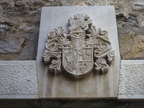 Stone relief, coat of arms on a house facade, Old Town of Vodice, Vodice, Dalmatia, Croatia, Europe