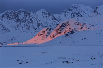 Evening light on snowy mountains, Arctic, Kulusuk, East Greenland, Greenland, North America