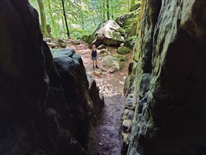 View from a crevice onto the Teuflische Acht hiking trail, Naturpark Südeifel, Irrel, Eifel,