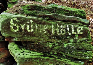 The Grüne Hölle rocky gorge, writing on mossy red sandstone in the Sauerschweiz, Southern Eifel