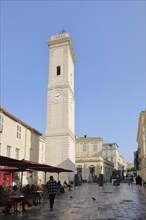 Clock tower Tour de l'Horloge with street bar, Tower with clock, Place de l'Horloge, Nîmes, Gard,