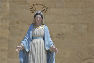 White statue of the Virgin Mary with crown and halo, detail, St-Sauveur church, Fos-sur-Mer,