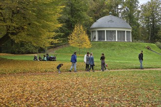 View of historic carousel with dome in autumn, walker, picnic, family outing, fallen leaves, leaf