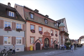 Historic department stores', tourist information centre, people, market square, Gengenbach,