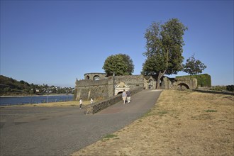 Bulwark with tower as town fortification on the banks of the Rhine, Rhine promenade, customs tower,