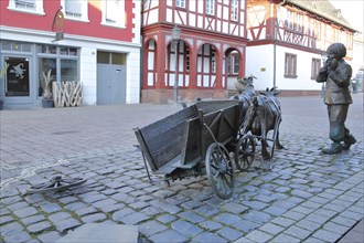 Sculpture goat cart with boy and broken cart, wheel, cart wheel, cart, cart, wagon, broken down,