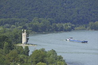 View of Mäuseturm on the Rhine with cargo ship, Binger Loch, Bingen, Rhine-Hesse region,