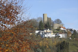 View of Oberreifenberg townscape with castle in autumn, Schmitten, Taunus, Hesse, Germany, Europe