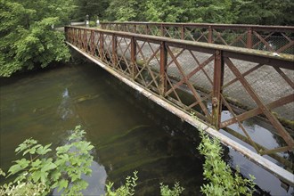 Bridge with railing over the Brigach, rusty, metal railing, castle park, Donaueschingen, Southern