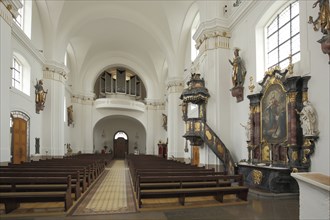 View of the organ of the baroque St. Johann Church, pulpit and altar with painting, interior view,