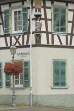 Graf Müller winery, street lamp with floral decoration, half-timbered house, Bischof-Blum-Platz,