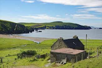 Coastal landscape with a small house near the sea, green hills and beach under a cloudy sky, crime