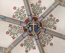 Cross of Jesus with the instruments of the scourge, keystone in the vault of the Cathedral of the