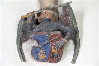 Archangel Michael with soul scales and sword, console stone in St Martin's Church, Plieningen,