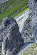 Mountain biker on a path in the mountains, Davos, Grisons, Switzerland, Europe