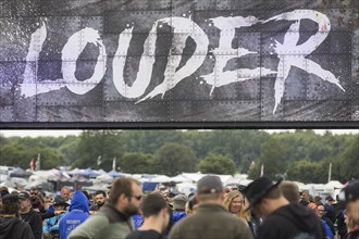 Admission control under the Louder lettering consisting of Louder Then Hell at the Wacken Open Air