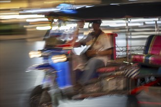 Tuk Tuk in traffic at night, Bangkok, Thailand, Asia