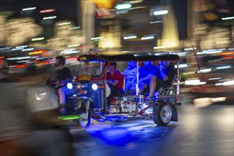 Tuk Tuk in traffic at night, Bangkok, Thailand, Asia