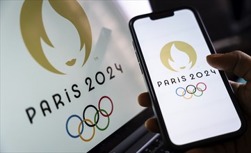 In this photo illustration, Paris 2024 olympic logo displayed on a smart phone