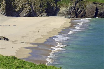 Calm sandy beach with shallow water and small waves, Blasket Islands, Dunmore Head, Ireland, Europe