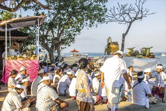 Ceremony on the beach. Religious ceremony of the Hindu faith on the beach of Sanur, Bali,