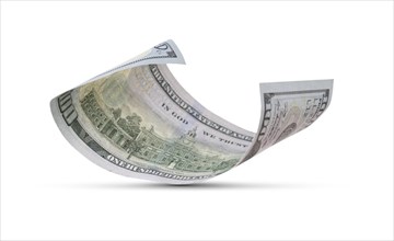 One hundred dollar bill floating down to surface with drop shadow isolated on a white background