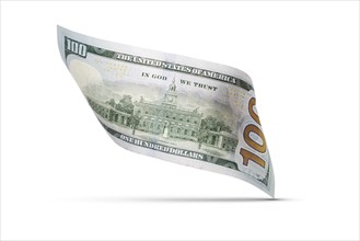 One hundred dollar bill floating down to surface with drop shadow isolated on a white background