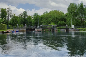 Paddlers waiting for the sluice to open, Spree Forest or Spreewald biosphere landscape,