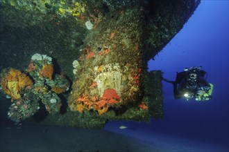 Diver with special equipment Stages additional diving cylinders Diving equipment for different gas