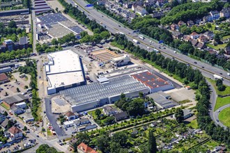 Construction site of a local shopping centre. Rewe Markt, Adler Modemarkt, Risse flower centre in