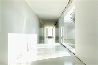 Abstract futuristic minimalist luminous white corridor leading to meditation and religious