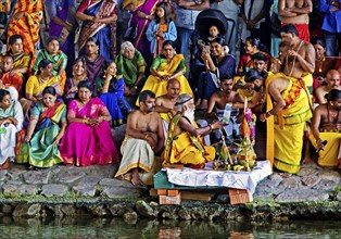 Hindus under the motorway bridge of the A2 at and in the Datteln-Hamm canal during ritual