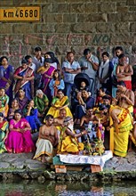 Hindus under the motorway bridge of the A2 at and in the Datteln-Hamm canal during ritual