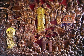 Wall relief in the Buddhist Thay Temple or Chua Thay or Master Temple, Sai Son Village, Hanoi