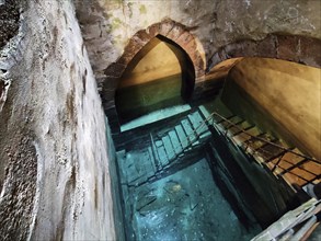 According to the inscription, the historic mikvah was built in 1260, the shaft is 25 metres deep