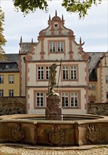 St George's Fountain in front of the castle in the grounds of Friedberg Castle, Friedberg, Hesse,