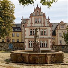 St George's Fountain in front of the castle in the grounds of Friedberg Castle, Friedberg, Hesse,