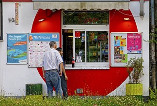 Two men at a kiosk, drinking hall, Dortmund, Ruhr area, North Rhine-Westphalia, Germany, Europe