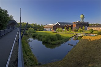 The footbridge with the water tower at the Jahrhunderthalle in Westpark, Bochum, Ruhr area, North