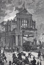 People panicking in front of a burning theatre building in a night disaster, The theatre fire in