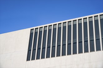 White façade with windows against a blue sky, NS Documentation Centre in the Kunstareal Munich,