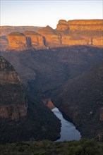 Sunset at Blyde River Canyon with Three Rondawels peak, view of canyon with Blyde River and table