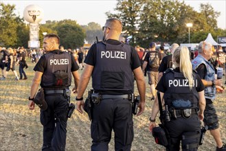 Police officers at the Wacken Open Air in Wacken. The traditional metal festival will take place