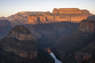 Sunset at Blyde River Canyon with Three Rondawels peak, view of canyon with Blyde River and table