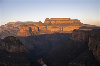 Sunset at Blyde River Canyon with Three Rondawels peak, view of canyon with Blyde River and table