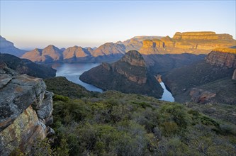 Sunset at Blyde River Canyon with Three Rondawels peak, view of canyon with Blyde River and table