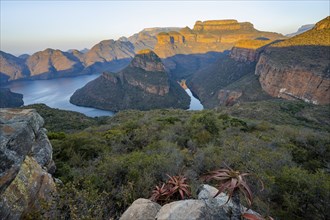 Sunset at Blyde River Canyon with Three Rondawels peak, view of canyon with Blyde River and table