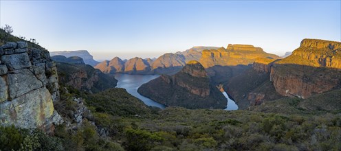 Panorama, sunset at Blyde River Canyon with Three Rondawels peak, view of canyon with Blyde River