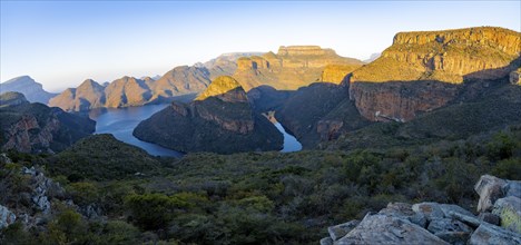 Panorama, sunset at Blyde River Canyon with Three Rondawels peak, view of canyon with Blyde River